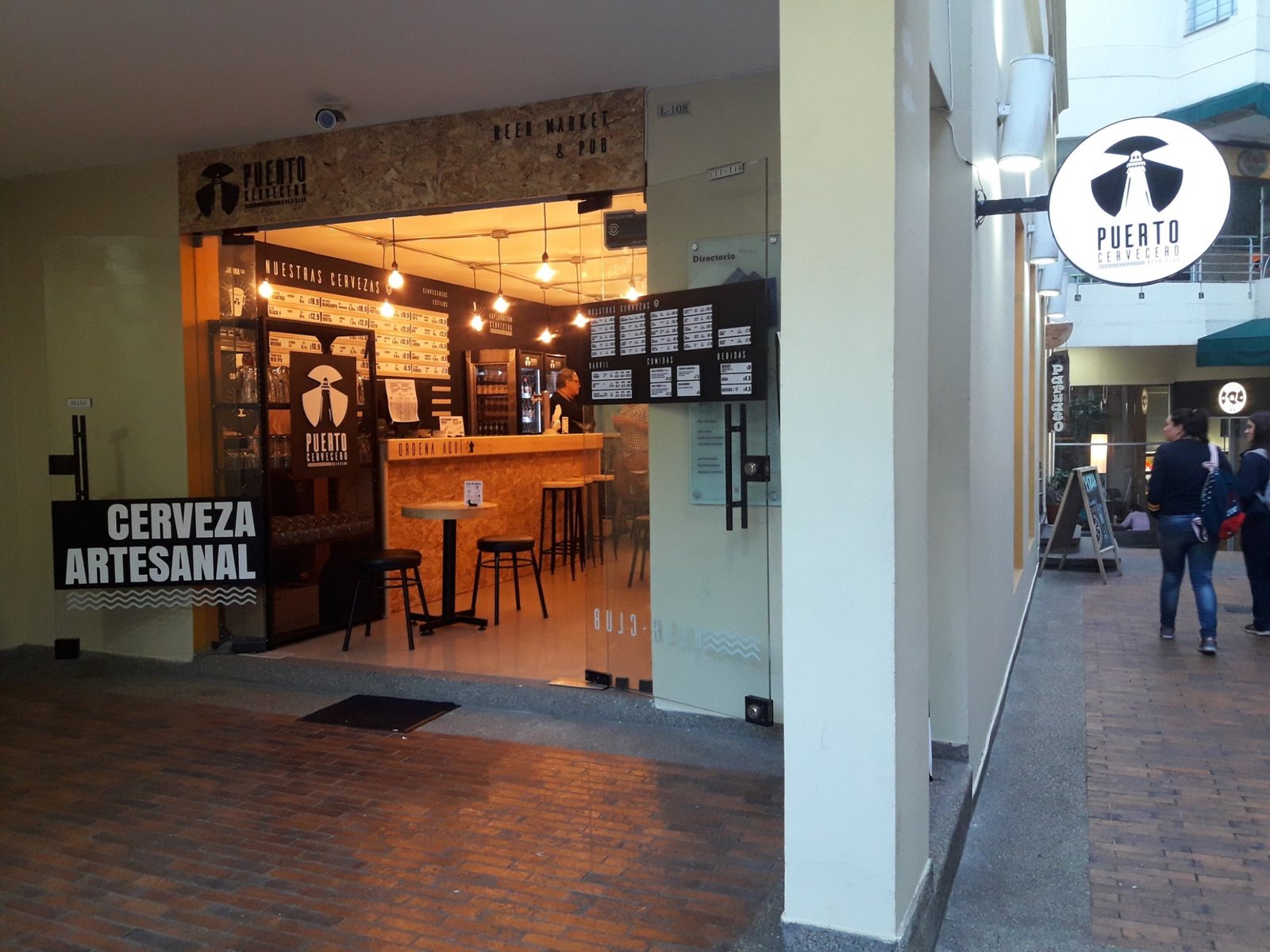 The Puerto Cervecero beer market and pub storefront