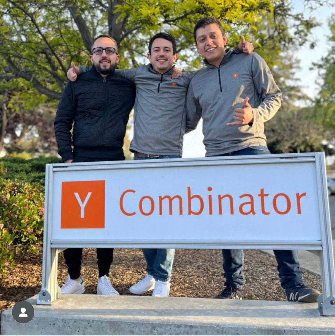 The HoyTrabajas co-founders at the Y Combinator sign